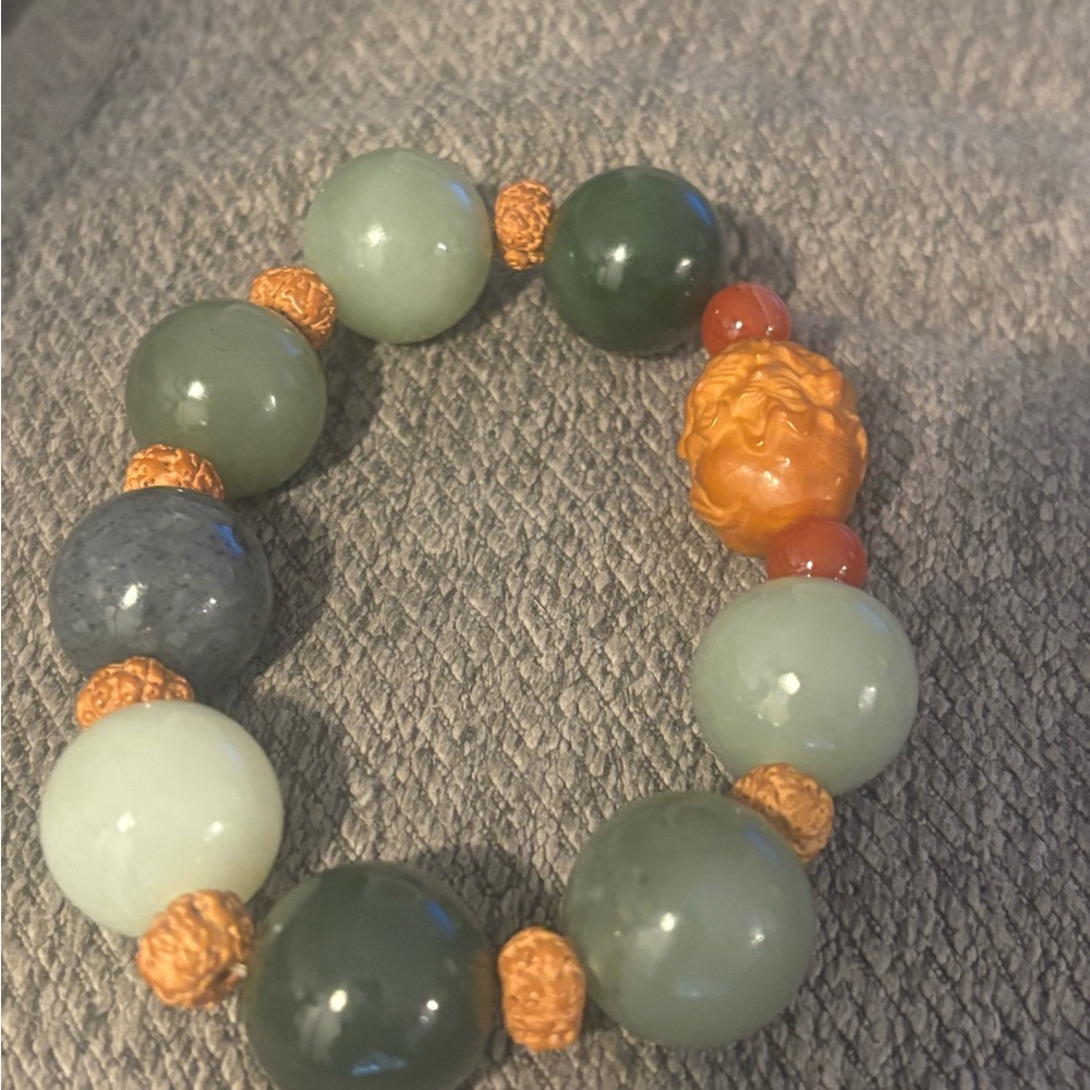 Jade Beaded Bracelet with Chinese Vajra Bodhi bead accents.